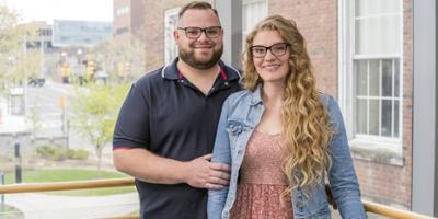 Couple graduates together with their Family Nurse Practitioner degrees