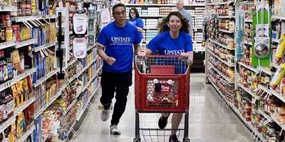Upstate dean dashes for a cause, donates $765 in groceries to Upstate's Paley’s Pantry