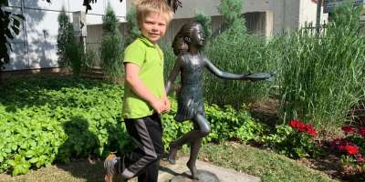 Young Noah in the garden at Golisano