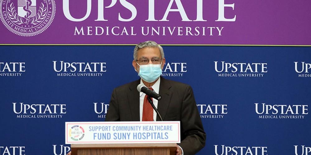 UUP RALLY: Upstate Medical University President Mantosh Dewan, MD, welcomes UUP leaders and members to rally on the Upstate campus, urging state leaders to reinvest in SUNY hospitals, which played an integral role in responding to and maintaining the health and safety of New Yorkers throughout the COVID-19 pandemic. At the event, UUP President Fred Kowal, New York State legislators, coalition members, and health care providers called on the state to restore $87 million for essential mission funding for SUNY’s public teaching hospitals in the upcoming 2022 state budget cycle.  