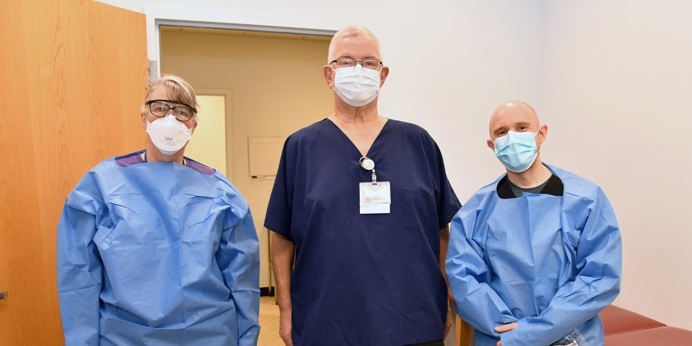 COMMUNITY HOSPITAL TESTERS: Community Hospital has been innundated with testing demands, keeping the staff extremely busy. Among those doing the testing are, from left Julie Cook, Robert McGarvey, Cory Emborski, Class of 2022.