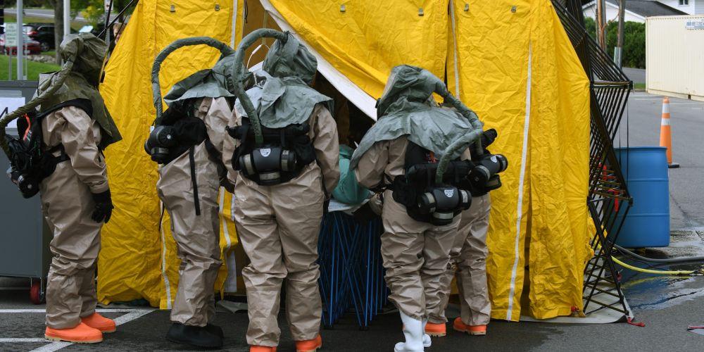 DECON TRAINING: Upstate University Hospital employees take part in a decontamination exercise as part of their crisis readiness training with Upstate’s Emergency Management department. The scenario was an accident with a truck carrying a hazardous liquid, which required “patients’ to be decontaminated.