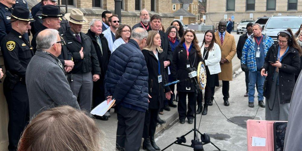 UPSTATE OFFERS XYLAZINE EXPERT: Dr Sarah Mahonski, assistant medical director of the Upstate Poison Center,  (at podium) speaks at press conference March 10 in Cortland, N.Y., with U.S. Sen. Chuck Schumer, about the dangers of xylazine. 