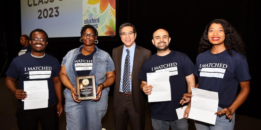 MATCH MADNESS: Upstate medical students found out where they will do their residency training during Match Day. From left are Zachariah Mohamed; Deashia McAlpine; Norton College of Medicine Dean Lawrence Chin, MD; Michael Vidal and Samantha Williams.