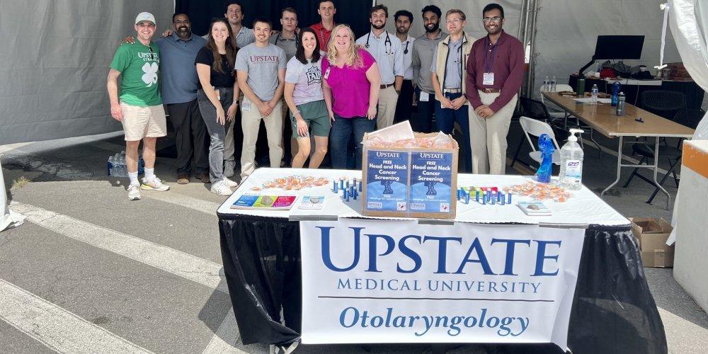 A HEALTHY FAIR OPTION: Upstate’s Department of Otolaryngology and Communication conducted head and neck cancer screenings at The Great New York State Fair earlier this week. More than 100 screenings were performed and over 1000 pairs of earplugs were passed out to fairgoers. This project was supported by the 2023 Cancer Prevention Community Service Award by the American Head and Neck Society and The Upstate Foundation Cancer Center Award.