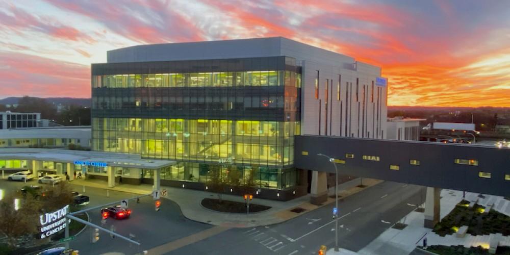 ALL AGLOW: Wednesday’s brilliant sunset provides a colorful backdrop to the busy Upstate Cancer Center.