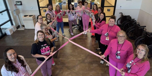 OCTOBER AWARENESS: Employees of the Upstate Cancer Center in Verona highlight October as Breast Cancer Awareness Month, by noting the connections all have in fighting breast cancer.