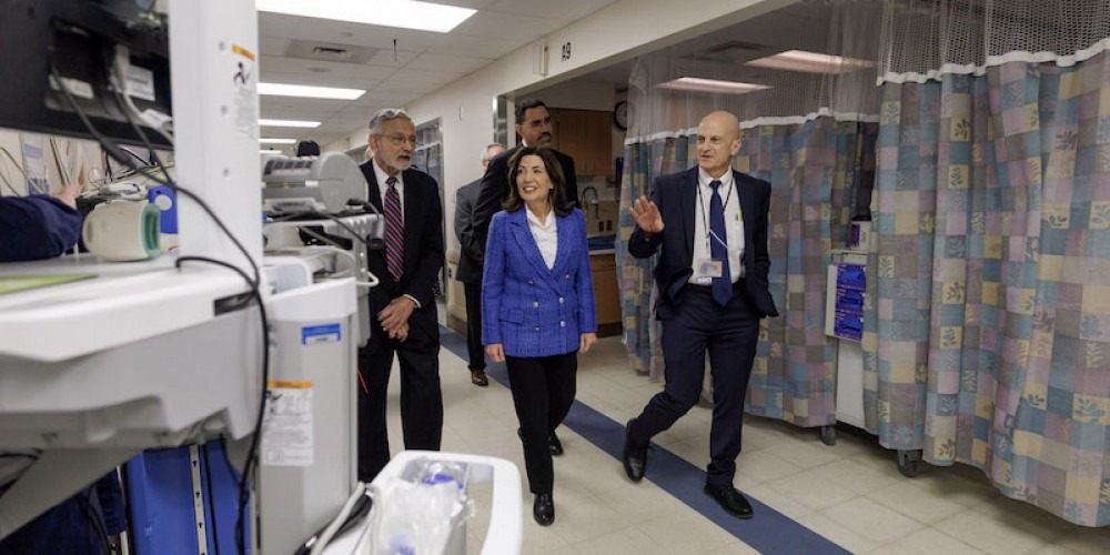 GUBERNATORIAL VISIT: New York Gov. Kathy Hochul walks through the Upstate Emergency Department joined by, from left, Upstate President Mantosh Dewan, MD; SUNY Chancellor John King, Jr., and Chief Executive Officer Robert Corona, DO, MBA. Upstate acknowledged its appreciation to the governor for including $200 million in the Executive Budget to begin essential upgrades to region’s only Level 1 trauma center for adults and children. 