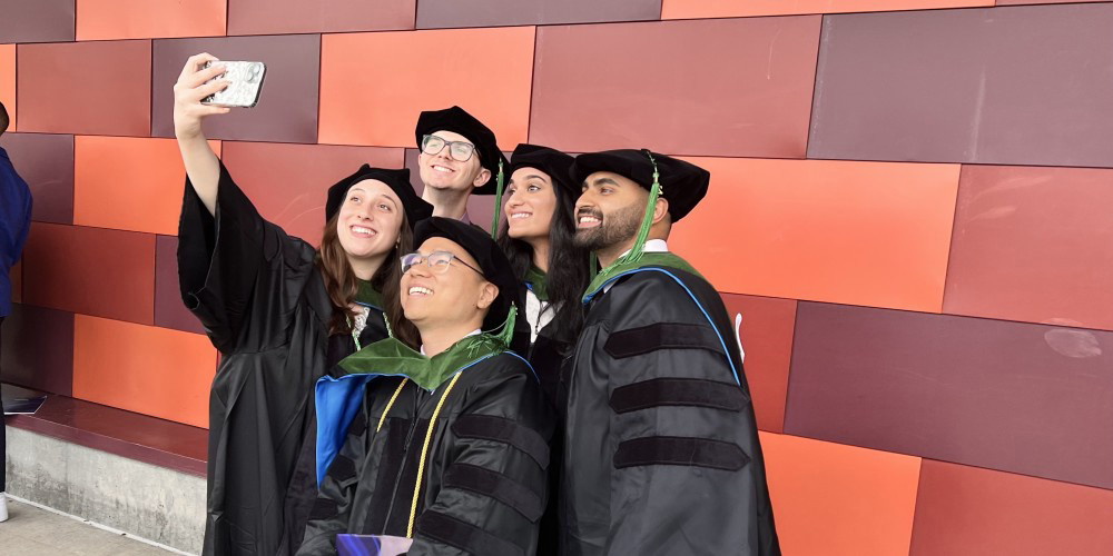 GRAD SELFIE: Smiles and selfies were commonplace during Upstate Medical University’s Commencement May 4. Four hundred and six degrees and certificates were handed out during ceremonies at the SRC Arena.