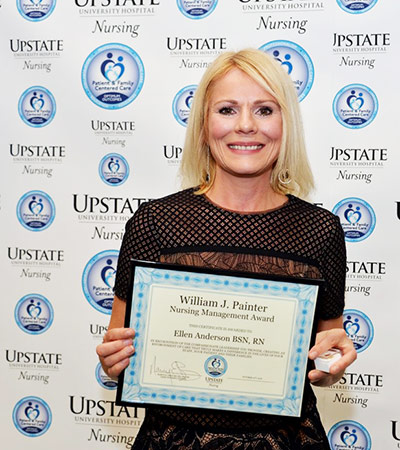 Ellen Anderson with her award.