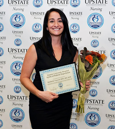 Kimberly Vucolo  with her award.