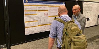 Justin presents a poster at AES 2022