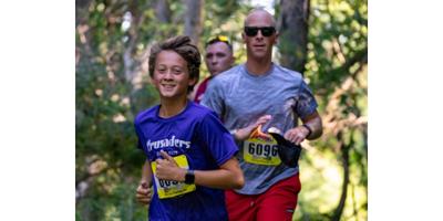 Carter and Dr. Auerbach running in Amer's epilepsy trail run