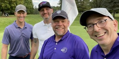 Dr. Auerbach and Justin golfing with our friends at EPI
