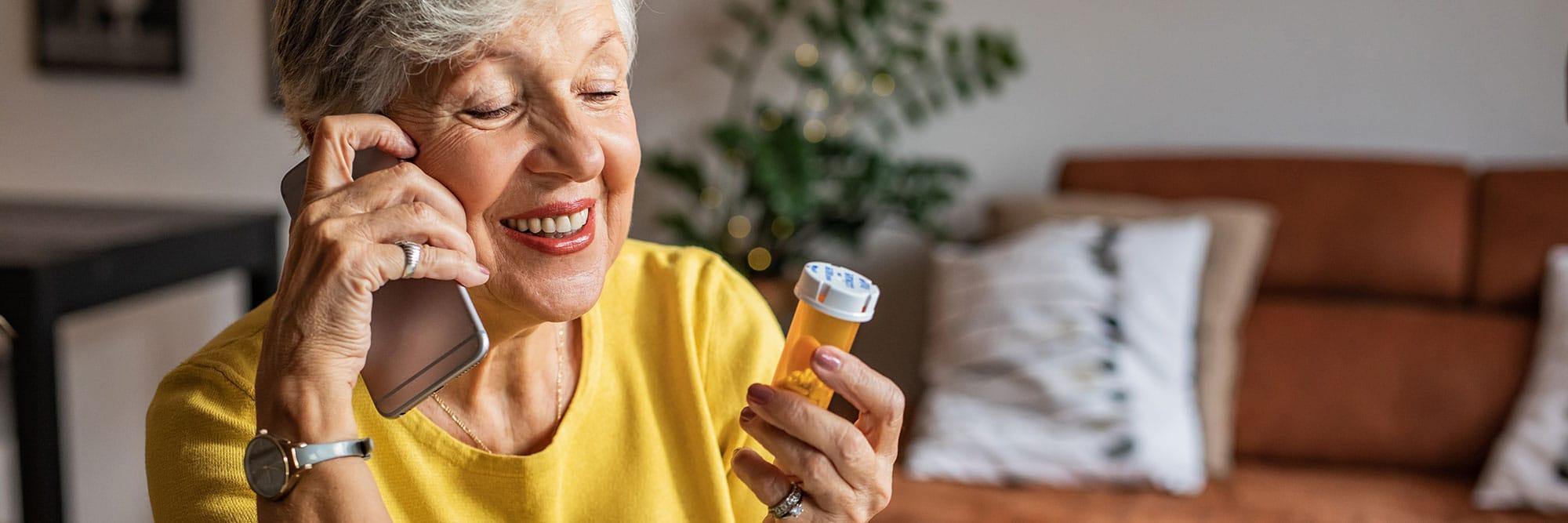 Older woman on phone asking question about prescription