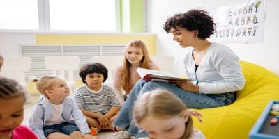 Woman talking to children