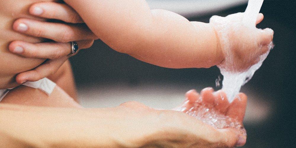 Mom and child washing hands