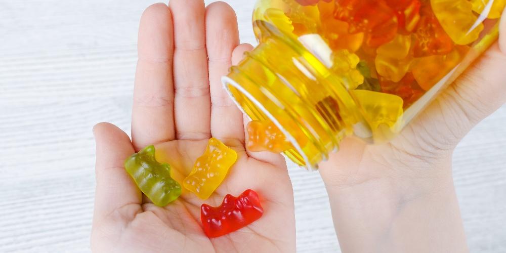 Gummies in hand