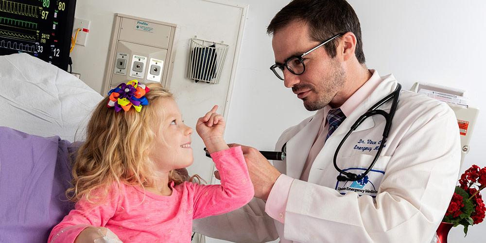 Dr. Vince Calleo with pediatric patient