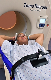 Patient positioned for SBRT treatment using an immobilization device and abdominal compression