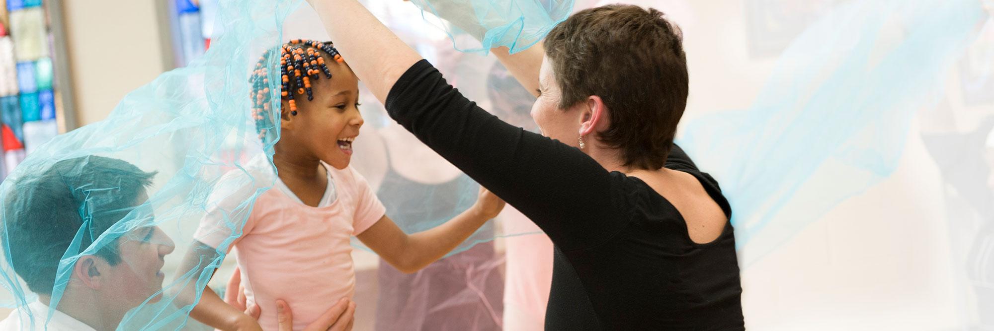 Special needs child particiaptes in a dance class