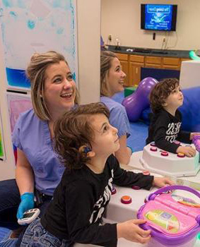 Special needs healthcare worker with pediatric patient