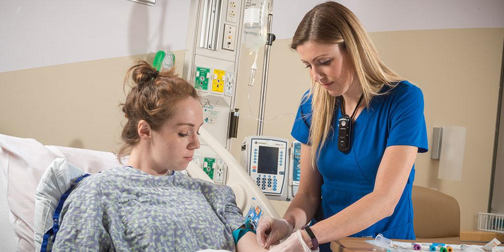 Patient in room with healthcare worker
