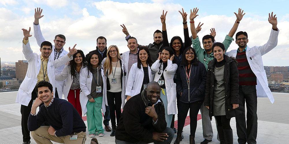 COM students on the helipad