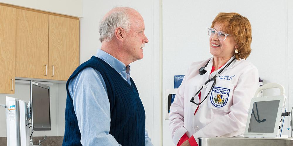 Dr. Karen Schiff, NP, C with patient in her office.