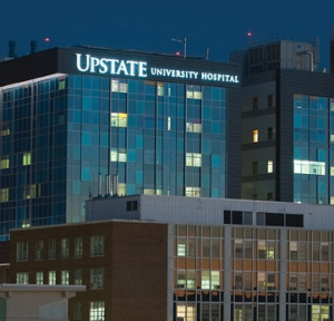 Upstate University Hospital at dusk.