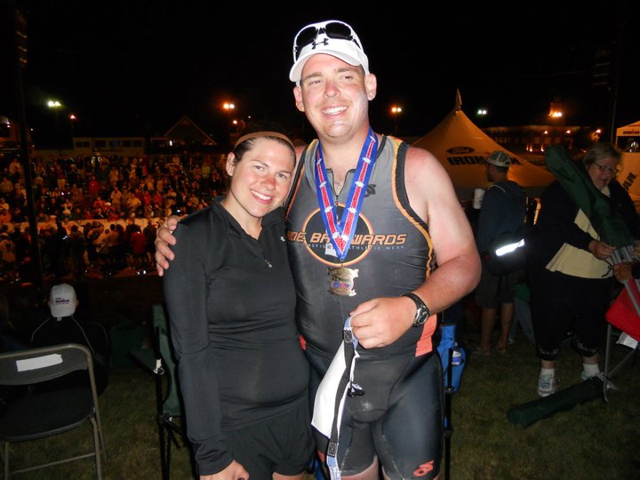 Jon Gdovin with his wife at the finish line of the Ironman Lake Placid.