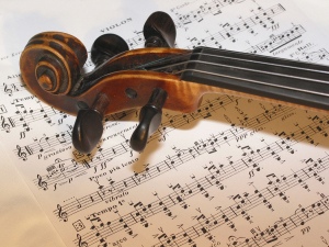 b Violin with sheet music