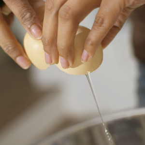 Hands Breaking Egg Hands Breaking Egg