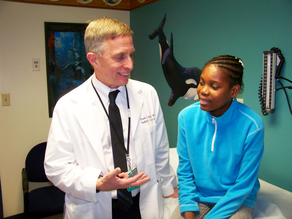 Frank Smith MD with Samantha Cadet, 15, of Haiti. Photo by Susan Keeter.