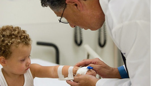 AHC2 Healthcare worker checkin on child's IV