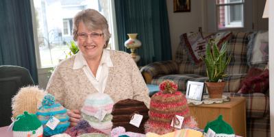 In cancer remission, Vicki Jellie knits caps for others