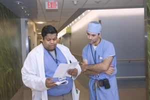 Healthcare workers looking at paper