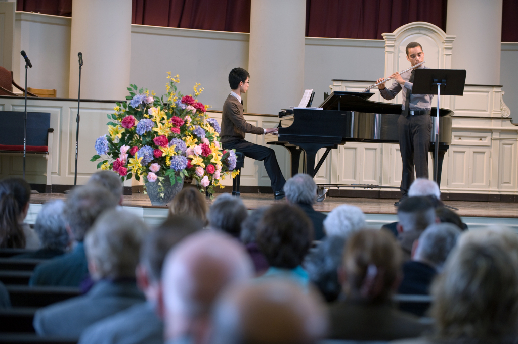 College of Medicine Class of 2015 students Matthew Auyong (piano) and John Charitable (flute) perform during the cadaver memorial service in April.