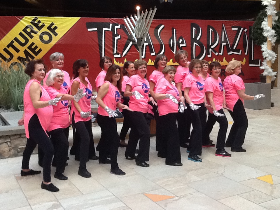 OASIS members participated in a flash mob Dec. 14 at Destiny USA.