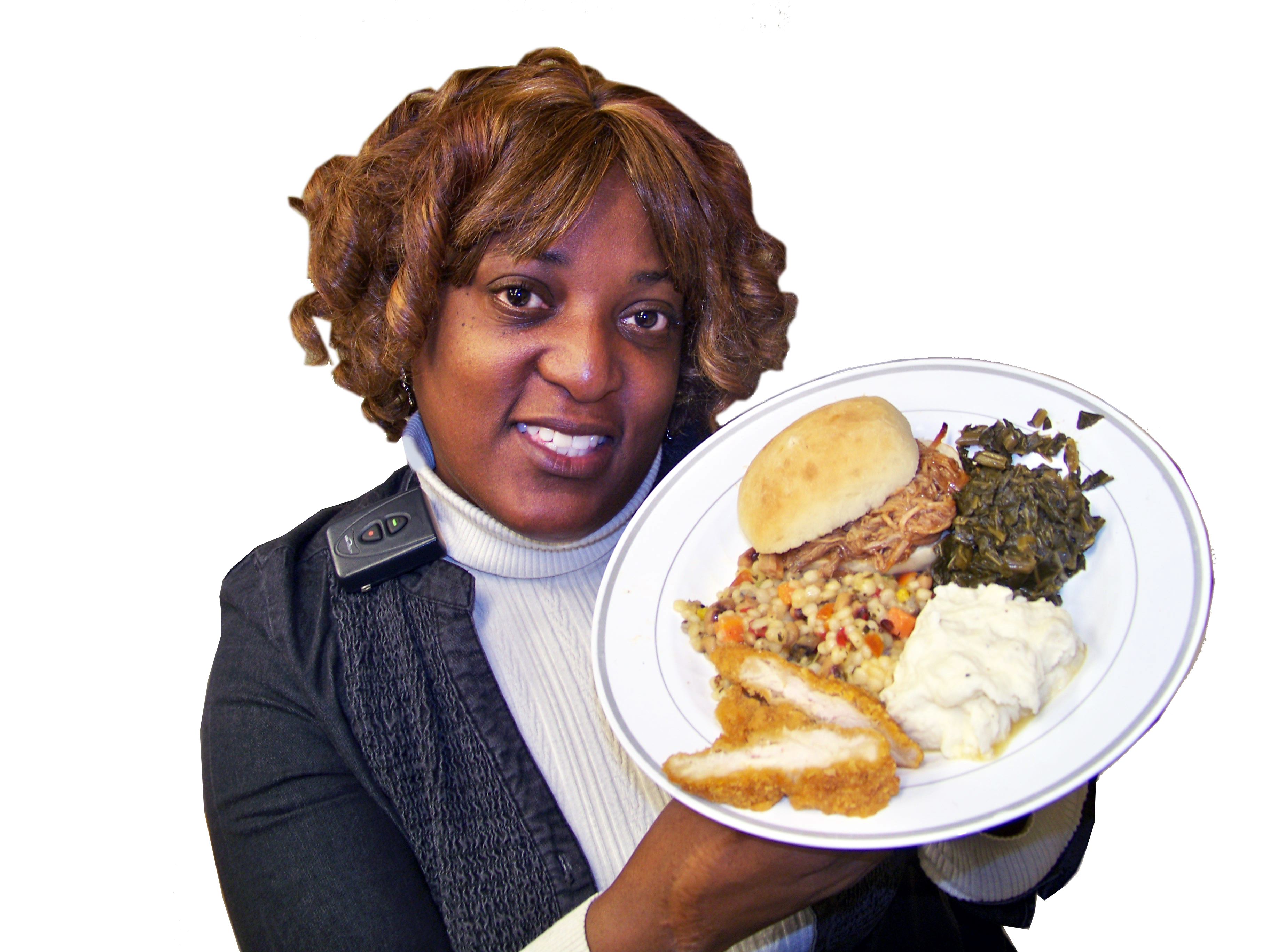 Upstate social worker Chevelle Jones-Moore gives a preview of the soul food lunch that will be served at the Feb. 6 Black History month event.