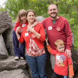 Isabel Moore-pictured with her parents and brother, who live in Rome-had emergency heart surgery when she was 12 days old, before her family knew she had 22q. She worked with a speech pathologist and underwent physical and occupational therapy during preschool.
