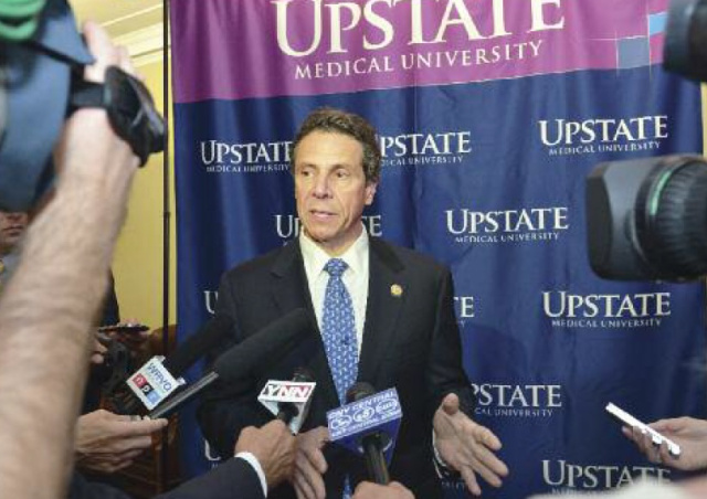 Gov. Andrew Cumo answered questions from the media during a recent visit to Upstate Medical University.