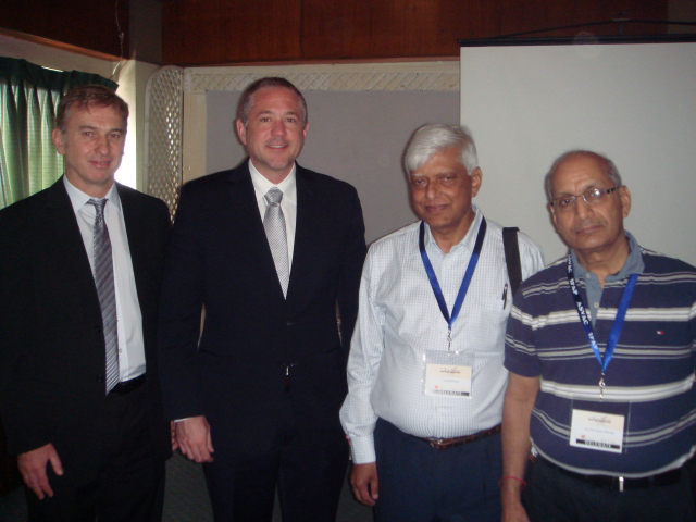 Dr. Joseph Domachowske, MD with Drs. Alain Bouckenooghe, MD, a vice president for medical affairs at Sanofi Pasteur, and two other delegates