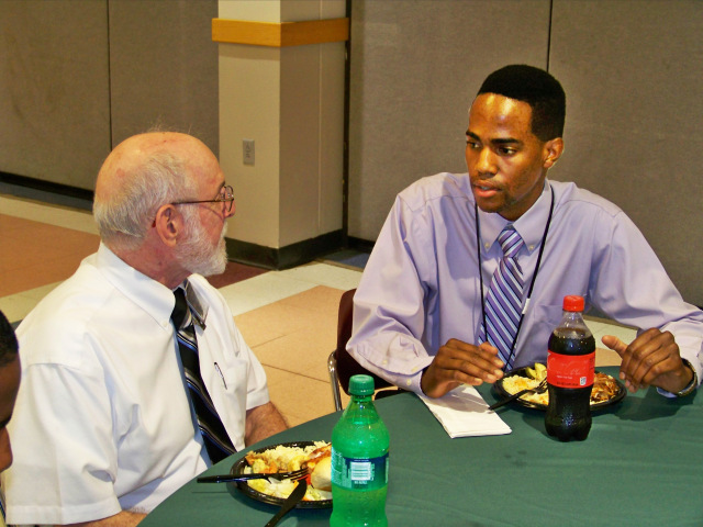 Intern Lenoi Carter talks with his mentor, Gerald Connor, at the welcome luncheon for the summer 2013 Synergy/Mercy Works summer internship program. Connor, a radiation safety officer at Upstate, says, Every medical center needs a medical physicist and a radiation safety officer. Part of the reason I am a mentor is to increase awareness of the field. These are invaluable careers that promise to have job openings in the future.