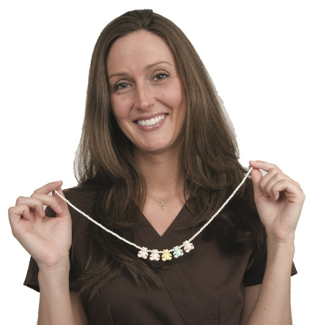 Nurse Megan Havener with her beloved necklace. Photo by Susan Kahn.