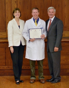 Sen. David Valesky graduates from Upstate's Project Medical Education. Dr. Conroy, MD is on his right and Upstate President Dr. David Smith, MD is on his left.