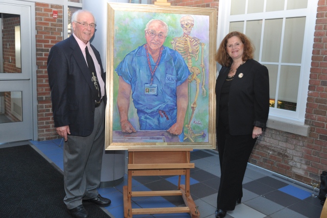 Professor Barry Berg, PhD with artist, Susan Keeter at the portrait unveiling.