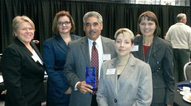 Attending the Workplace Wellness Awards were wellness coordinator Suzanne Brisk, Smoking Cessation Program director Cynthia Cary, Bruce Simmons, MD, director of employee/student health, Renae Rokicki, and hospital administrator Joyce Mackessy.