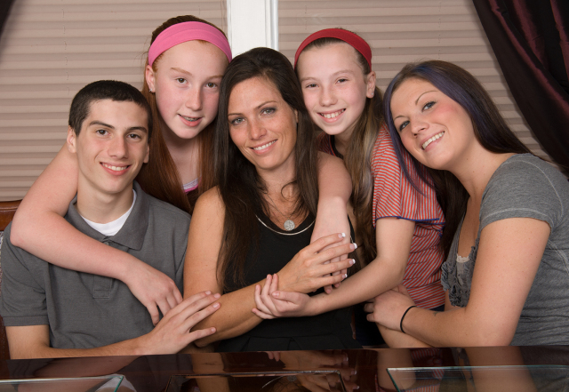 Shelleen Soltys is surrounded by her children, Angie, 22, Jack. 14, Chloe, 12 and Clara, 10. Photo by Susan Kahn.