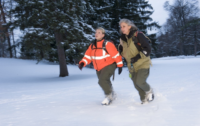 Renae Rokicki and Ann Salvagni in the woods.